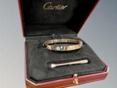 A diamond set 'Love' Bangle, by Cartier,