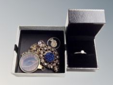 A box of Scottish cape clip, yellow metal 22k gold plate eye hologram necklace,