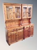 A two-section glazed pine kitchen dresser