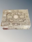 A 19th century Chinese export heavily carved mother of pearl gaming box,