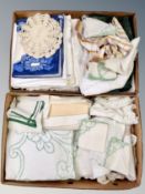 Two boxes of vintage linens