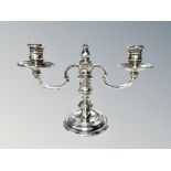 A loaded silver twin-branch candelabrum, William Comyns & Sons Ltd, London 1975, height 16.5cm.