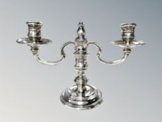 A loaded silver twin-branch candelabrum, William Comyns & Sons Ltd, London 1975, height 16.5cm.