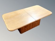 A teak low coffee table,