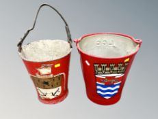 Two metal fire buckets.