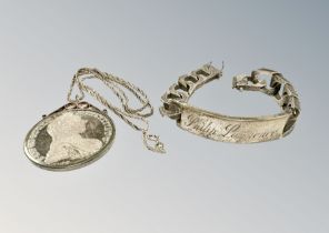 A sterling silver identity bracelet 72g, together with a Sterling silver chain with coin pendant.