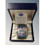 A Moorcroft enamelled pill box in fitted case