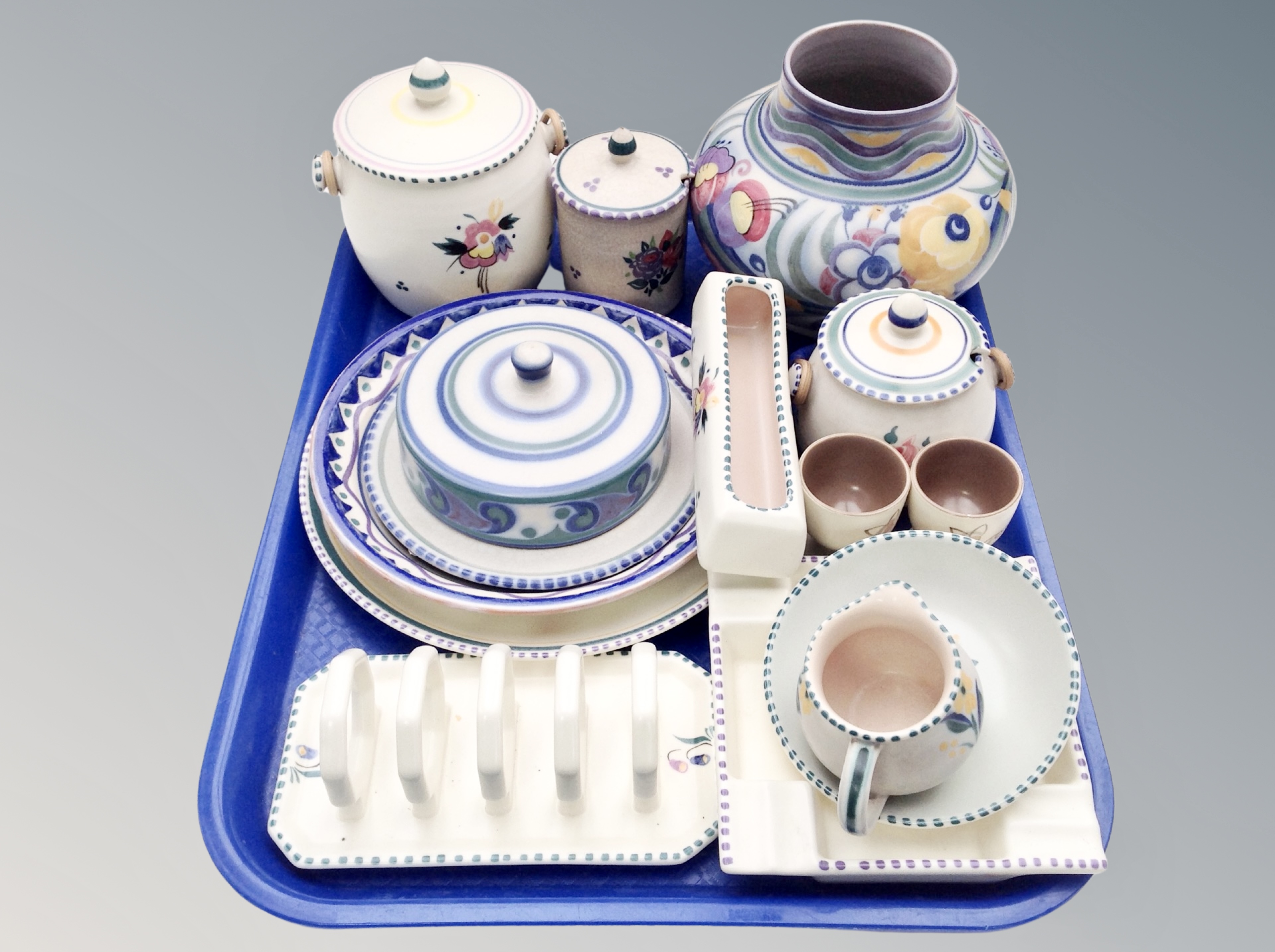 A tray of Poole pottery including toast rack, vase,