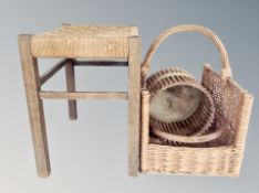 A rattan stool and two wicker baskets