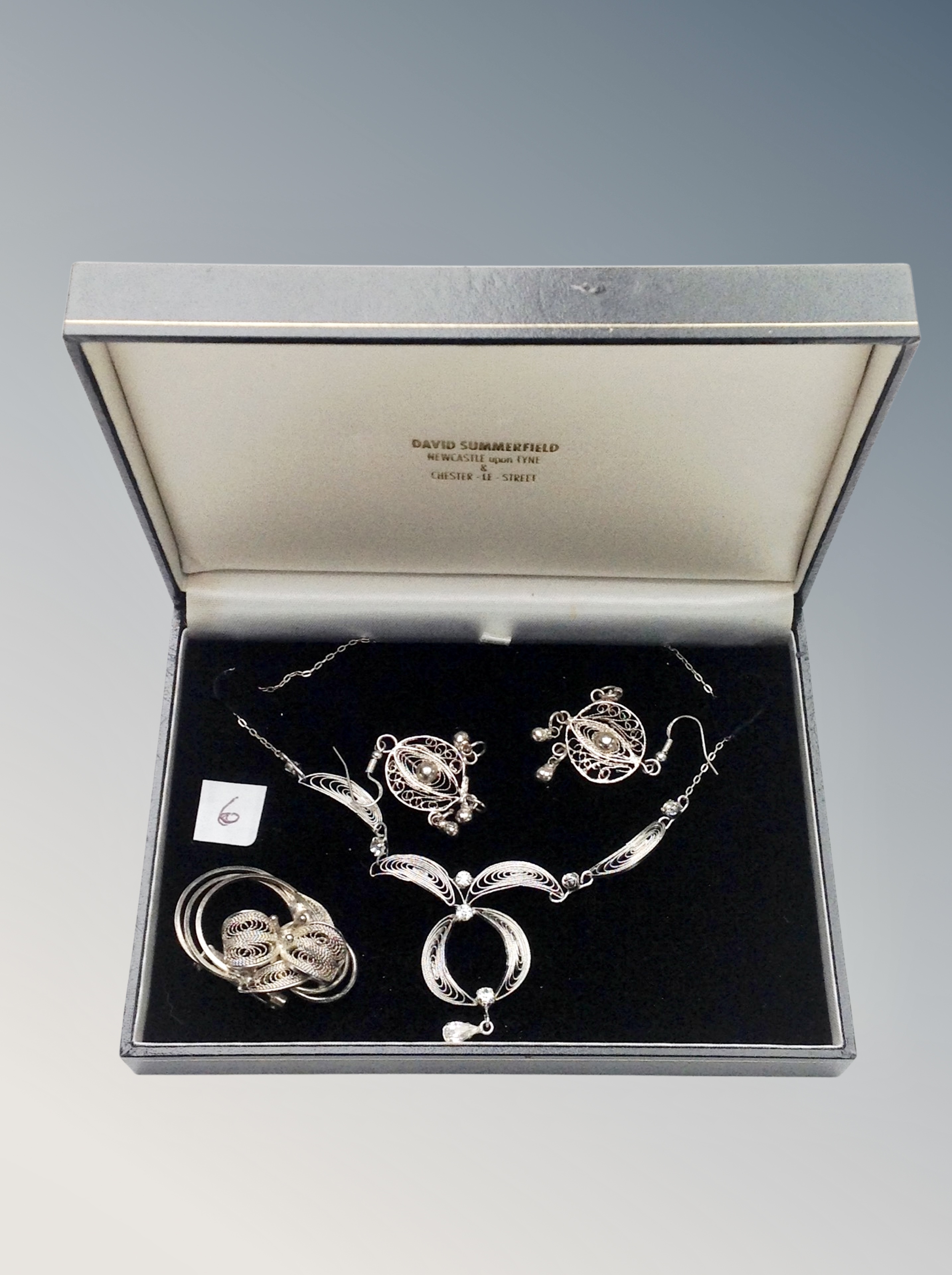 A box of silver wire filigree necklace,