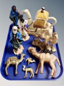 A Tony Wood Staffordshire teapot in the form of a camel, Italian figures in Arab dress,