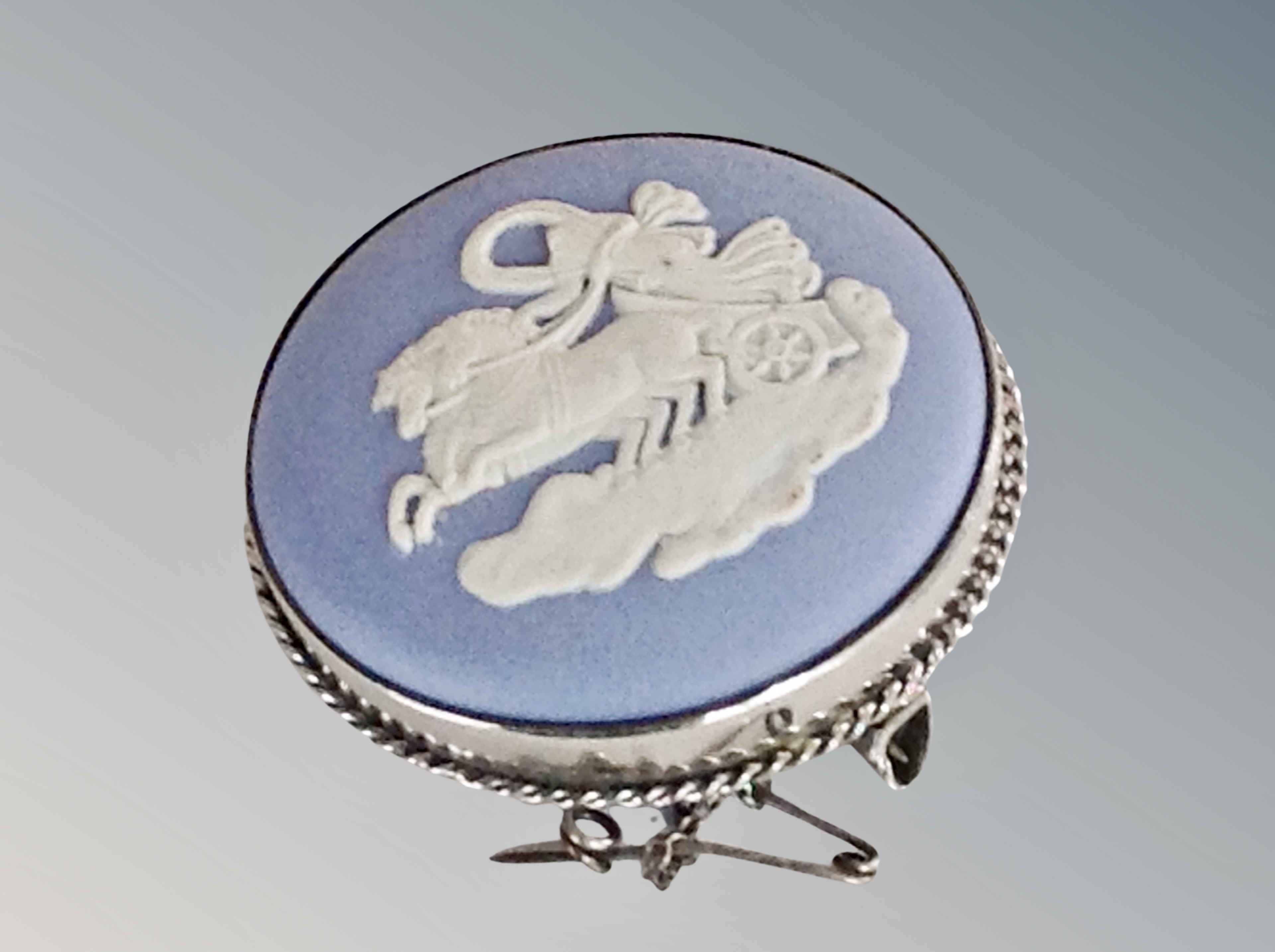 A silver mounted Wedgwood Jasperware brooch