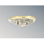 An 18ct gold diamond solitaire ring, the old-cut stone weighing approximately 0.25 carat, size K.
