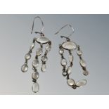 A pair of silver moonstone earrings