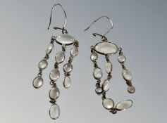 A pair of silver moonstone earrings