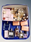 A collection of perfume miniatures and soaps