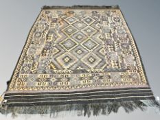 An Afghan flatweave kilim 275 cm x 235 cm