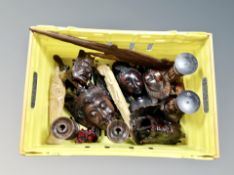 A box of far eastern carvings and wall masks