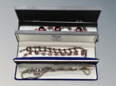 Three jewellery boxes of necklaces including two silver and amber necklaces examples