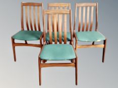 Four mid century teak dining chairs