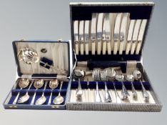 Two cases of stainless steel cutlery