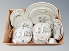 A quantity of Poole dinner ware on green ground