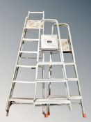 Three aluminium step ladders