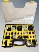 A plastic case of die cast locomotive spare parts : wheels, fittings,