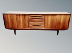 A mid century dining room suite comprising of long sideboard fitted with drawers, width 220 cm,