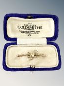 A 9ct gold seed pearl bow brooch, width 33mm. CONDITION REPORT: 2.