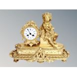 A French gilt bronzed figural eight day mantel clock