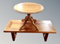 A teak low coffee table,