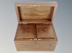 A 19th century oak tea caddy