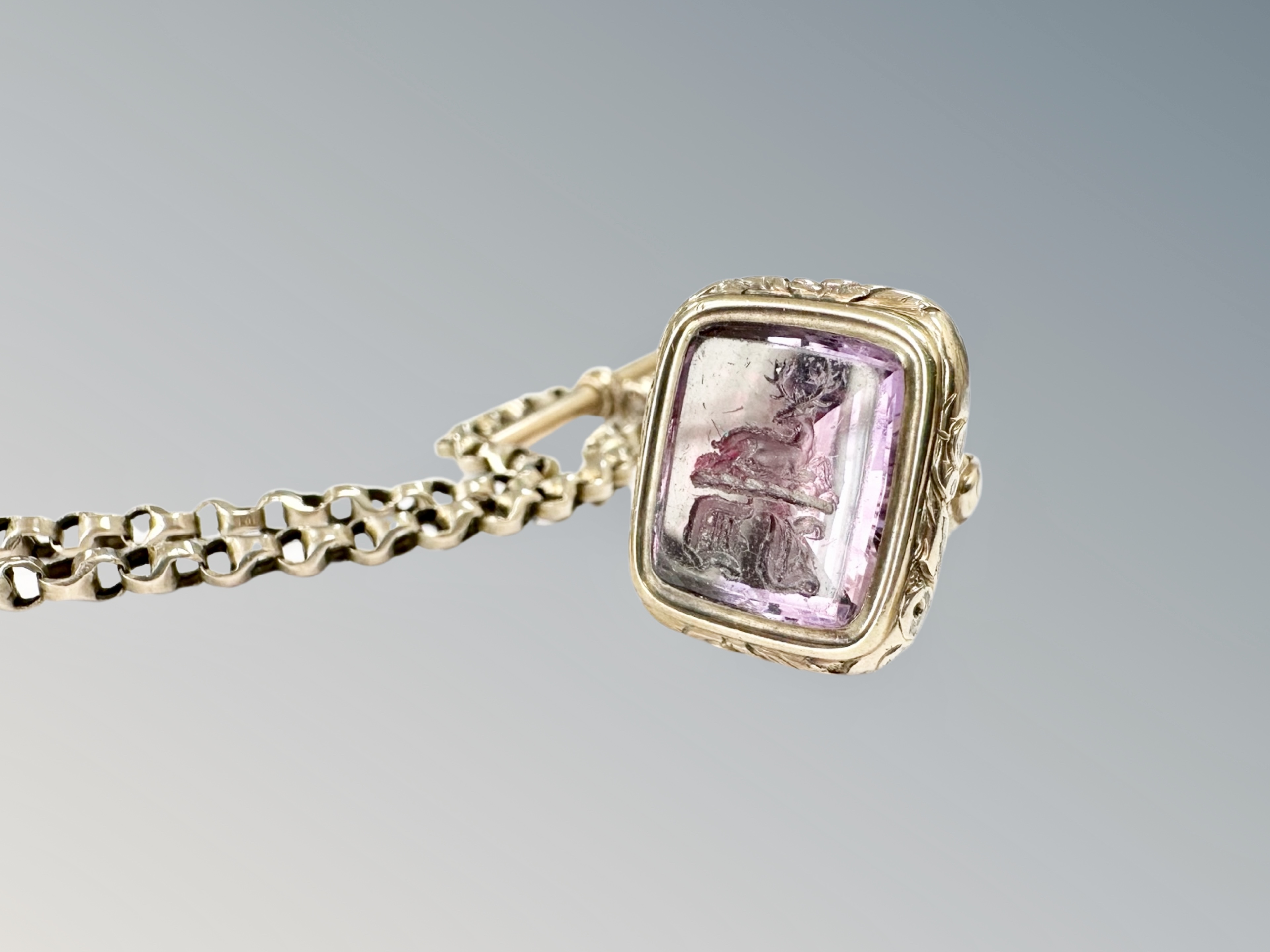 A gold plated watch Albert chain with carved intaglio amethyst-coloured seal - Image 2 of 2