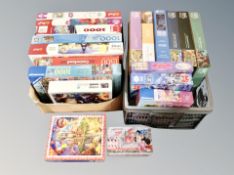 Two boxes of jigsaw puzzles