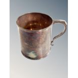 A silver mug, Birmingham marks, height 6.5 cm CONDITION REPORT: 100.