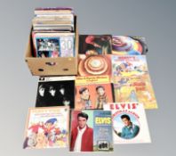 A box of LP records : The Beatles, Elvis Presley, ELO,
