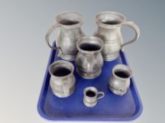 Six 19th century graduated pewter tankards