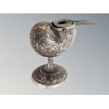 A silver plated and engraved inkwell in the form of a shell,