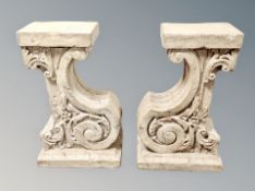 A pair of decorative classical style composite pedestals,