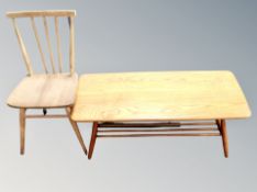 An Ercol elm low coffee table width 105 cm together with an Ercol chair