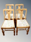 Four oak dining room chairs