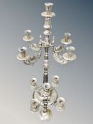 An ornate five sconce silver plated candelabrum,