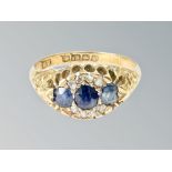 An 18ct gold sapphire and diamond ring, size L CONDITION REPORT: 3.