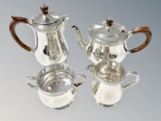 A Lindisfarne silver four-piece tea service, Reid & Sons, London 1974, water jug 19.5cm high.