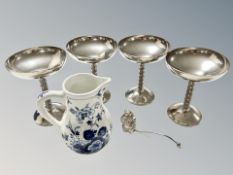 Four silver plated goblets,
