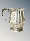 A silver mug, Birmingham marks, height 9.5cm CONDITION REPORT: 208.