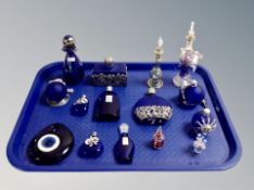 A tray of blue glass dressing table bottles, Gozo iridescent glass,