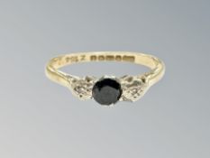 An 18ct gold sapphire and diamond ring, size L CONDITION REPORT: 2.5g. Misshapen.