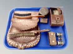 Two copper hearth brushes and scoops, pair of opera glasses, match vesta depicting a tavern scene,